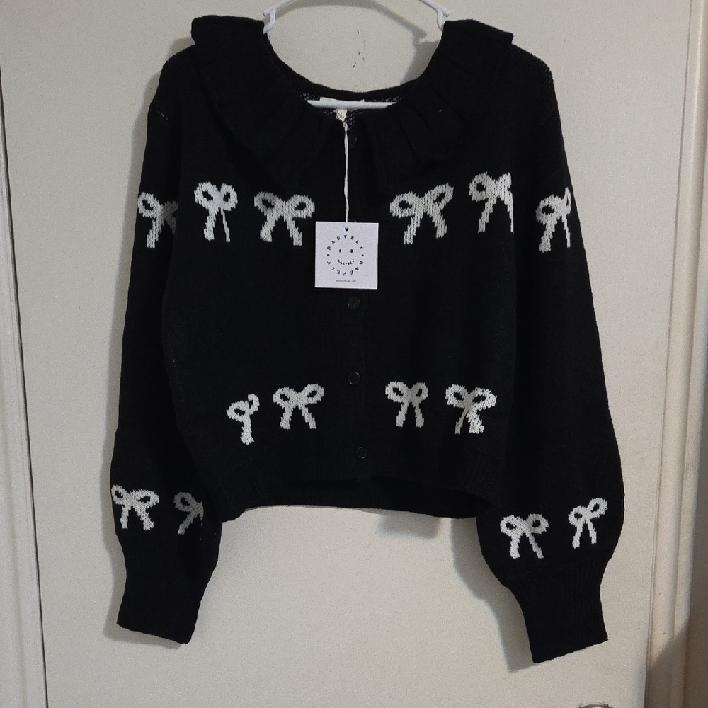 Elegant Black Cardigan with White Bow Accents